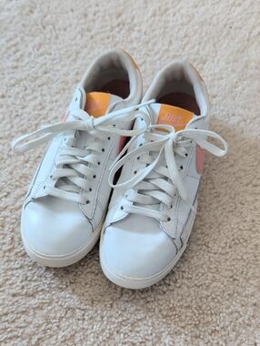 Nike White Sneakers with Pink Swoosh and Orange Tongue